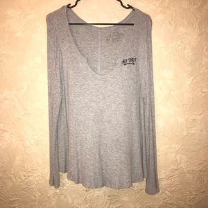 Grey shirt that says free spirit